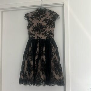 Alice and Olivia black lace dress.